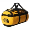Reisetasche The North Face Base Camp Duffel M Summit Gold TNF Black -Camping Geschäft 1 52SA ZU3 HERO